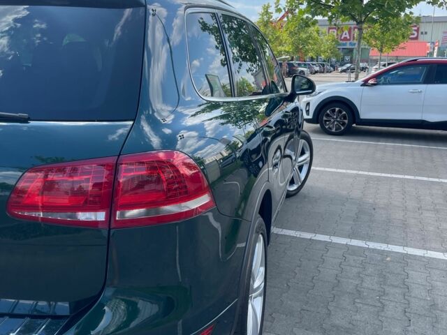 Зелений Фольксваген Туарег, об'ємом двигуна 3 л та пробігом 290 тис. км за 18865 $, фото 3 на Automoto.ua