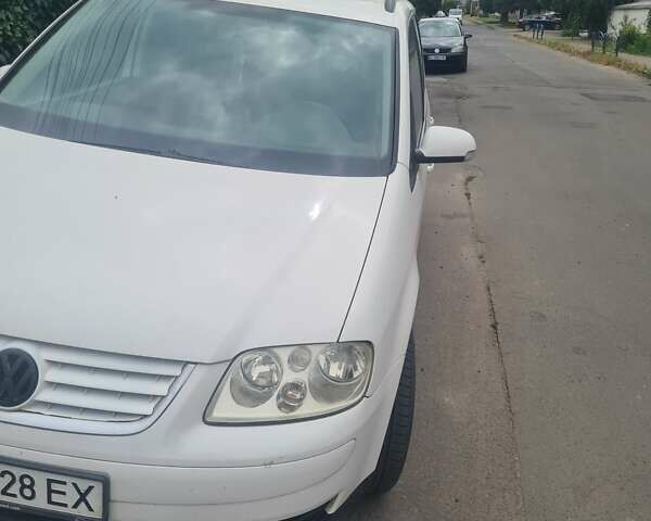 Білий Фольксваген Туран, об'ємом двигуна 1.98 л та пробігом 324 тис. км за 6500 $, фото 4 на Automoto.ua