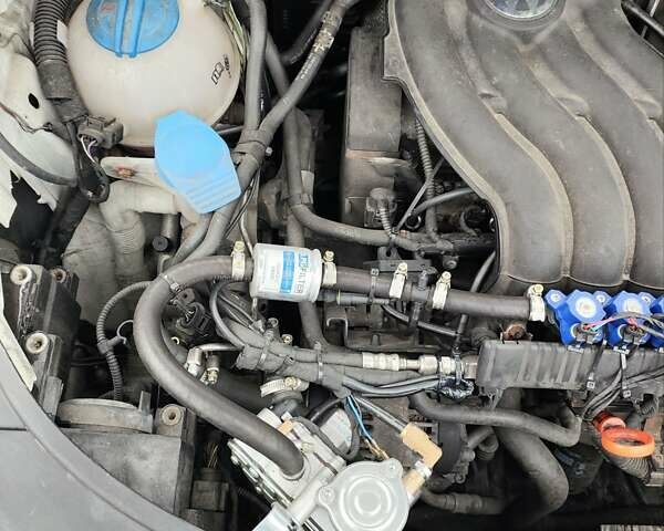 Білий Фольксваген Туран, об'ємом двигуна 2 л та пробігом 99 тис. км за 9800 $, фото 43 на Automoto.ua