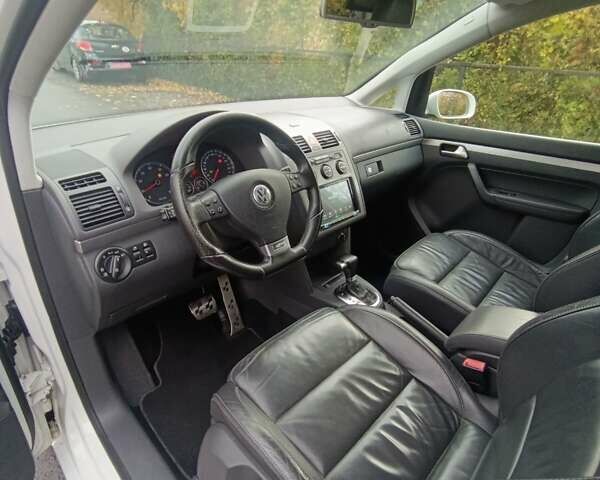 Белый Фольксваген Туран, объемом двигателя 1.4 л и пробегом 182 тыс. км за 8400 $, фото 58 на Automoto.ua