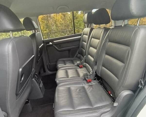 Белый Фольксваген Туран, объемом двигателя 1.4 л и пробегом 182 тыс. км за 8400 $, фото 47 на Automoto.ua