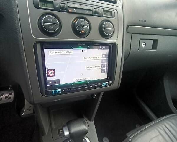 Белый Фольксваген Туран, объемом двигателя 1.4 л и пробегом 182 тыс. км за 8400 $, фото 57 на Automoto.ua