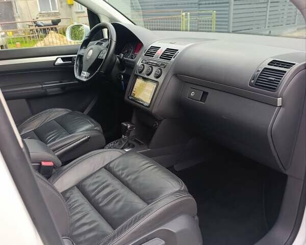 Белый Фольксваген Туран, объемом двигателя 1.4 л и пробегом 182 тыс. км за 8400 $, фото 37 на Automoto.ua