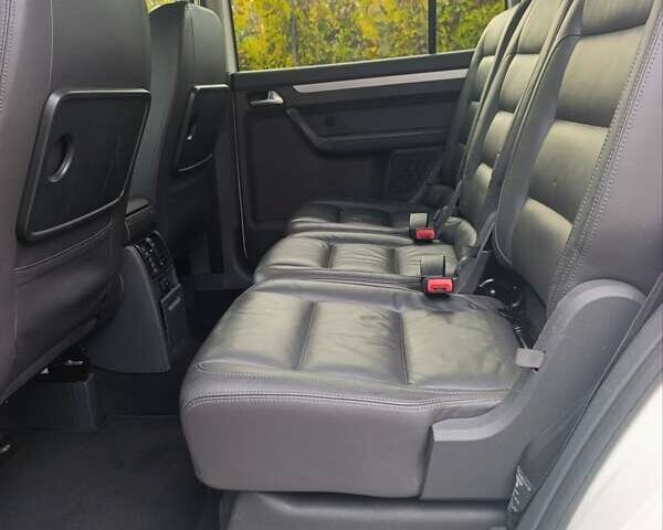 Белый Фольксваген Туран, объемом двигателя 1.4 л и пробегом 182 тыс. км за 8400 $, фото 55 на Automoto.ua