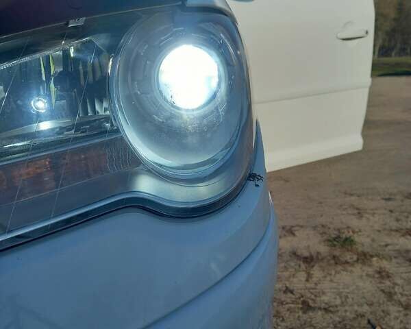 Белый Фольксваген Туран, объемом двигателя 1.39 л и пробегом 316 тыс. км за 8000 $, фото 2 на Automoto.ua