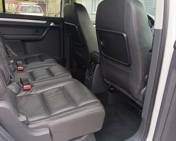 Белый Фольксваген Туран, объемом двигателя 1.4 л и пробегом 182 тыс. км за 8400 $, фото 41 на Automoto.ua