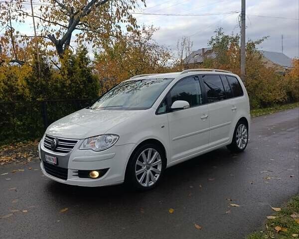 Белый Фольксваген Туран, объемом двигателя 1.4 л и пробегом 182 тыс. км за 8400 $, фото 19 на Automoto.ua