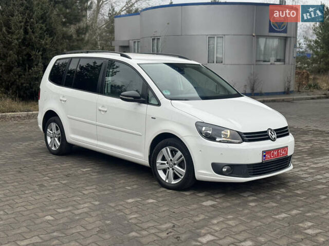 Білий Фольксваген Туран, об'ємом двигуна 2 л та пробігом 251 тис. км за 12300 $, фото 1 на Automoto.ua
