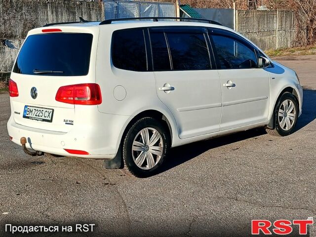 Білий Фольксваген Туран, об'ємом двигуна 2 л та пробігом 362 тис. км за 11700 $, фото 1 на Automoto.ua