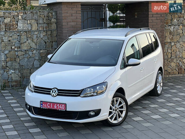 Белый Фольксваген Туран, объемом двигателя 1.4 л и пробегом 130 тыс. км за 9000 $, фото 1 на Automoto.ua