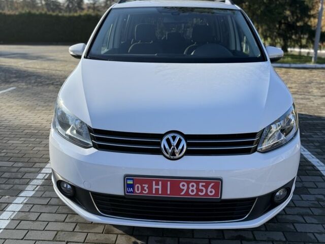 Белый Фольксваген Туран, объемом двигателя 1.4 л и пробегом 161 тыс. км за 11900 $, фото 2 на Automoto.ua