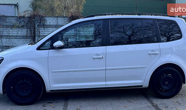 Білий Фольксваген Туран, об'ємом двигуна 1.97 л та пробігом 194 тис. км за 12000 $, фото 2 на Automoto.ua