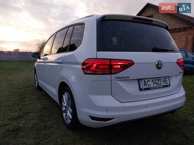 Белый Фольксваген Туран, объемом двигателя 1.97 л и пробегом 313 тыс. км за 13499 $, фото 1 на Automoto.ua