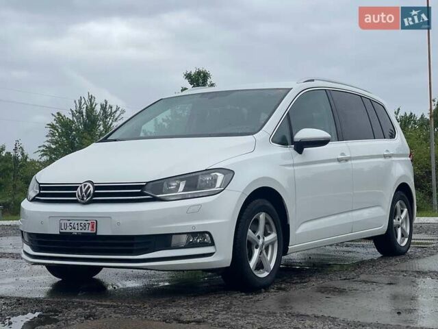 Белый Фольксваген Туран, объемом двигателя 1.4 л и пробегом 159 тыс. км за 15700 $, фото 1 на Automoto.ua