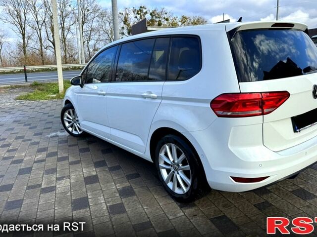 Білий Фольксваген Туран, об'ємом двигуна 2 л та пробігом 187 тис. км за 15500 $, фото 1 на Automoto.ua