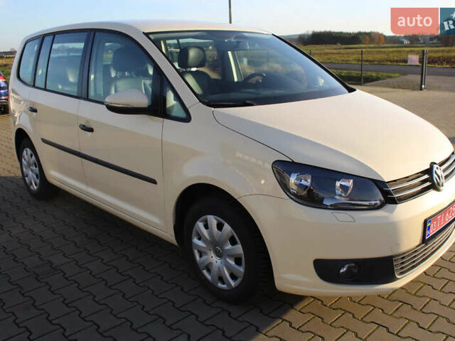 Белый Фольксваген Туран, объемом двигателя 1.97 л и пробегом 145 тыс. км за 11000 $, фото 1 на Automoto.ua