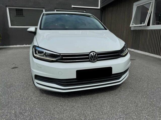 Белый Фольксваген Туран, объемом двигателя 2 л и пробегом 74 тыс. км за 5600 $, фото 1 на Automoto.ua