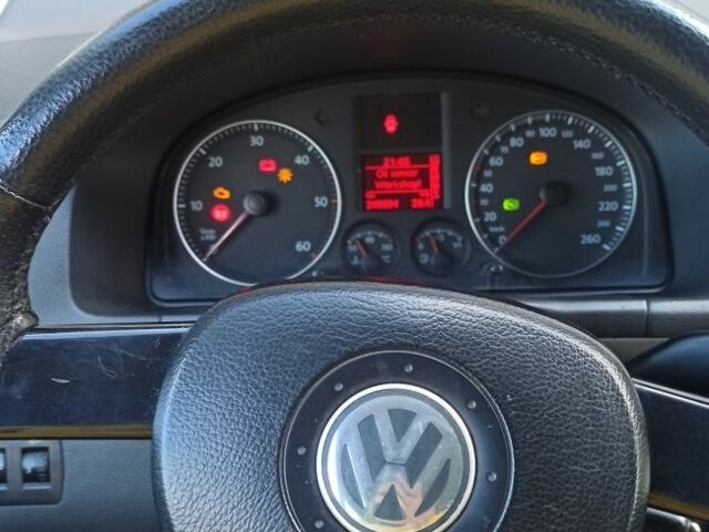 Бежевый Фольксваген Туран, объемом двигателя 2 л и пробегом 250 тыс. км за 4500 $, фото 4 на Automoto.ua