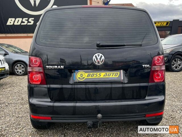 Черный Фольксваген Туран, объемом двигателя 1.9 л и пробегом 332 тыс. км за 6999 $, фото 4 на Automoto.ua