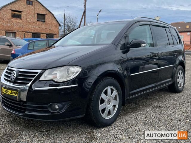 Черный Фольксваген Туран, объемом двигателя 1.9 л и пробегом 332 тыс. км за 6999 $, фото 2 на Automoto.ua
