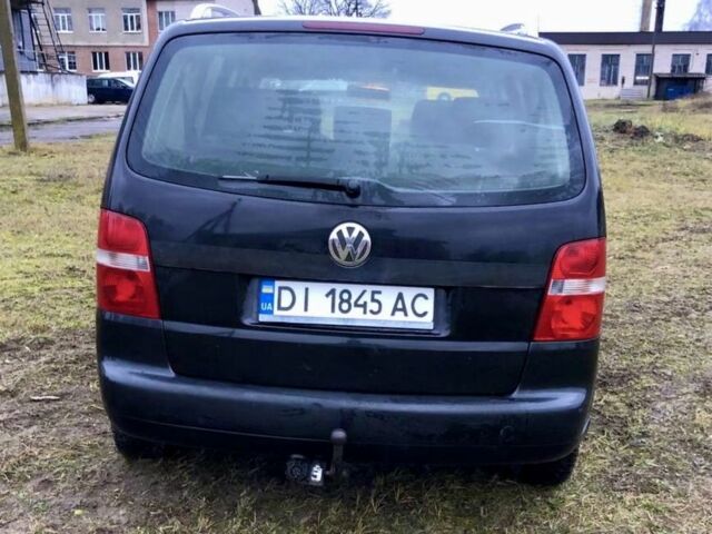 Черный Фольксваген Туран, объемом двигателя 2 л и пробегом 400 тыс. км за 4999 $, фото 6 на Automoto.ua