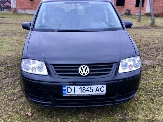 Черный Фольксваген Туран, объемом двигателя 2 л и пробегом 400 тыс. км за 4999 $, фото 2 на Automoto.ua