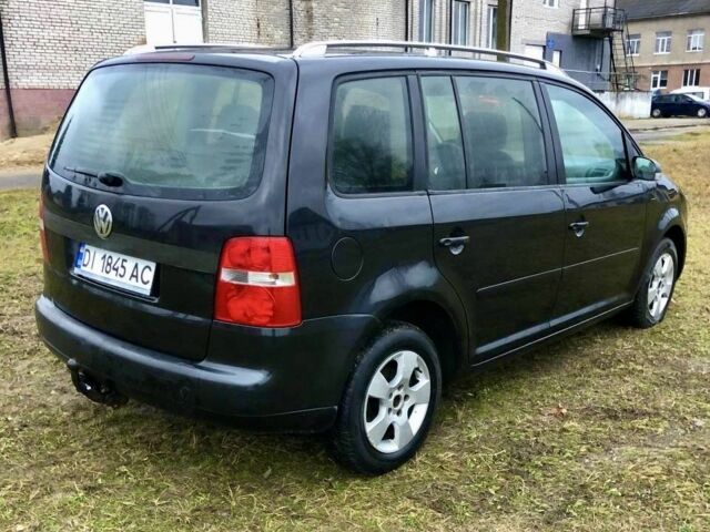 Черный Фольксваген Туран, объемом двигателя 2 л и пробегом 400 тыс. км за 4999 $, фото 5 на Automoto.ua