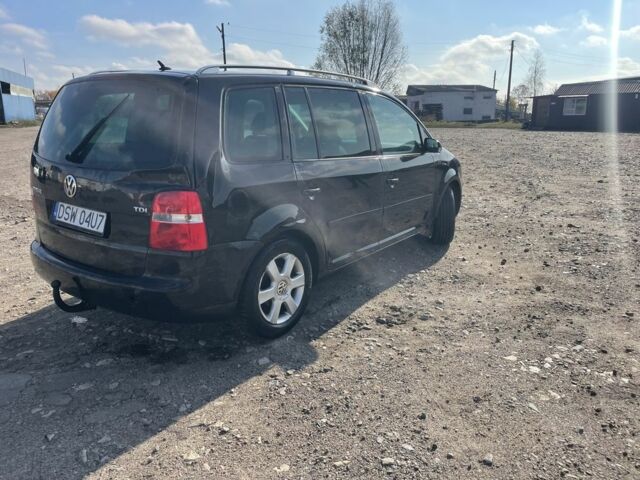 Черный Фольксваген Туран, объемом двигателя 2 л и пробегом 250 тыс. км за 2500 $, фото 5 на Automoto.ua