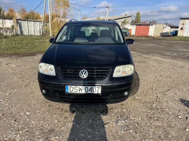 Черный Фольксваген Туран, объемом двигателя 2 л и пробегом 250 тыс. км за 2500 $, фото 2 на Automoto.ua