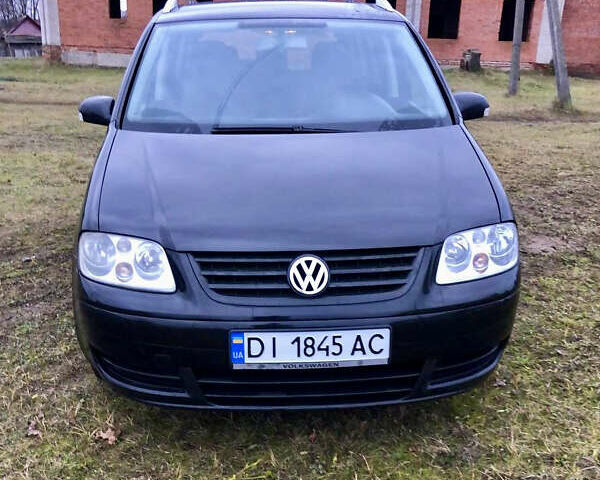 Черный Фольксваген Туран, объемом двигателя 1.97 л и пробегом 400 тыс. км за 4999 $, фото 2 на Automoto.ua