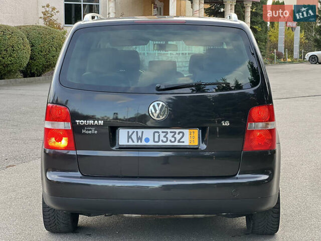 Черный Фольксваген Туран, объемом двигателя 1.6 л и пробегом 192 тыс. км за 4900 $, фото 5 на Automoto.ua