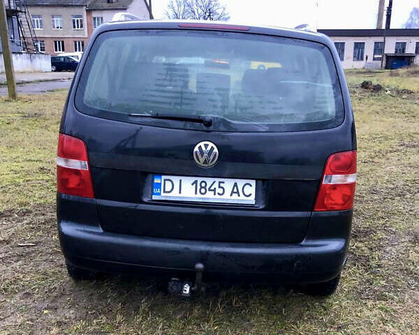 Черный Фольксваген Туран, объемом двигателя 1.97 л и пробегом 400 тыс. км за 4999 $, фото 5 на Automoto.ua