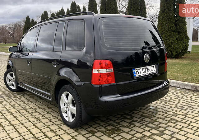 Чорний Фольксваген Туран, об'ємом двигуна 1.6 л та пробігом 222 тис. км за 7000 $, фото 2 на Automoto.ua