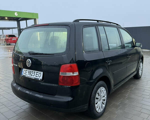 Чорний Фольксваген Туран, об'ємом двигуна 1.6 л та пробігом 290 тис. км за 5550 $, фото 4 на Automoto.ua