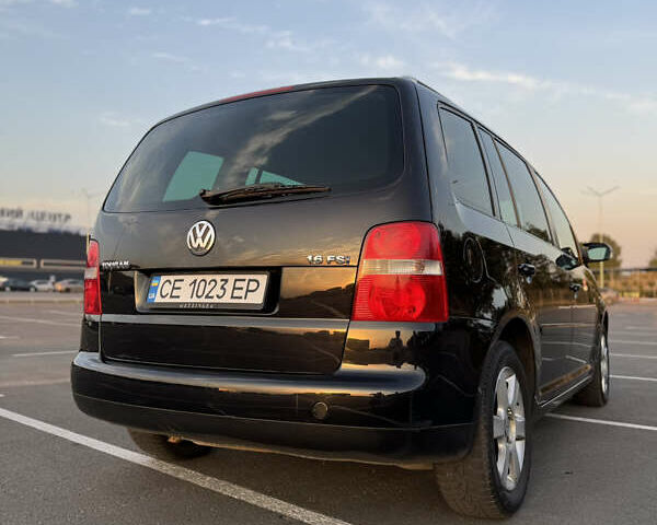 Черный Фольксваген Туран, объемом двигателя 1.6 л и пробегом 253 тыс. км за 5500 $, фото 15 на Automoto.ua