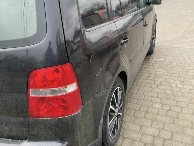 Черный Фольксваген Туран, объемом двигателя 1.6 л и пробегом 229 тыс. км за 4650 $, фото 3 на Automoto.ua