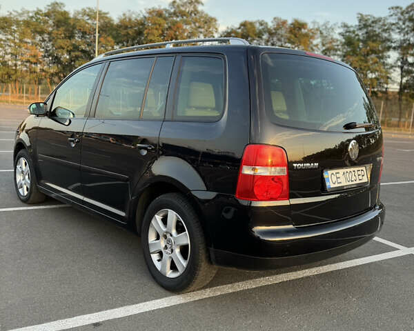 Черный Фольксваген Туран, объемом двигателя 1.6 л и пробегом 253 тыс. км за 5500 $, фото 17 на Automoto.ua