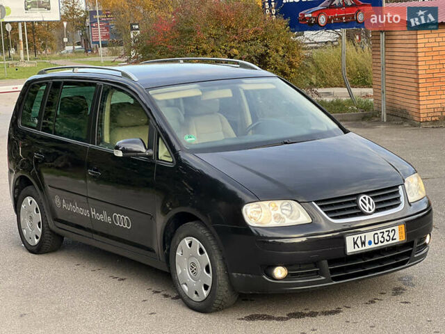 Черный Фольксваген Туран, объемом двигателя 1.6 л и пробегом 192 тыс. км за 4900 $, фото 8 на Automoto.ua