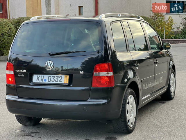 Черный Фольксваген Туран, объемом двигателя 1.6 л и пробегом 192 тыс. км за 4900 $, фото 4 на Automoto.ua