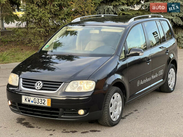 Черный Фольксваген Туран, объемом двигателя 1.6 л и пробегом 192 тыс. км за 4900 $, фото 7 на Automoto.ua