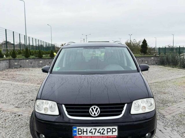 Черный Фольксваген Туран, объемом двигателя 1.6 л и пробегом 264 тыс. км за 5000 $, фото 1 на Automoto.ua