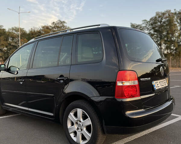 Черный Фольксваген Туран, объемом двигателя 1.6 л и пробегом 253 тыс. км за 5500 $, фото 14 на Automoto.ua