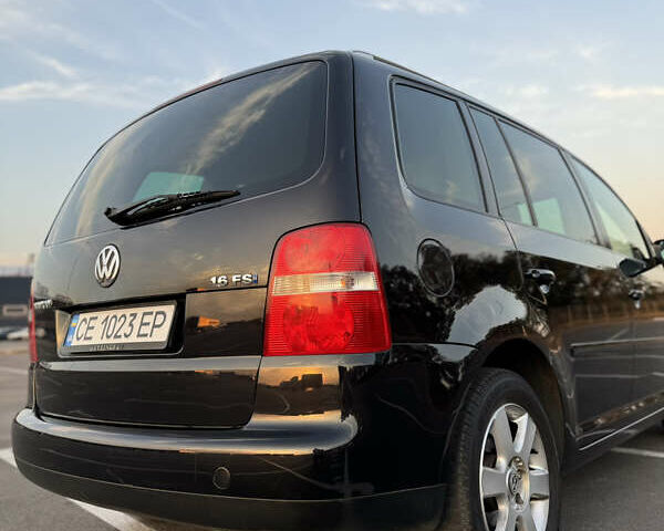 Черный Фольксваген Туран, объемом двигателя 1.6 л и пробегом 253 тыс. км за 5500 $, фото 11 на Automoto.ua