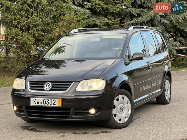 Черный Фольксваген Туран, объемом двигателя 1.6 л и пробегом 192 тыс. км за 4900 $, фото 25 на Automoto.ua