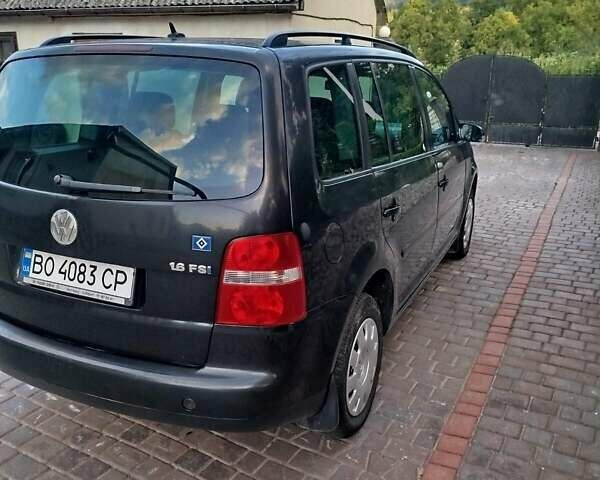 Черный Фольксваген Туран, объемом двигателя 1.6 л и пробегом 167 тыс. км за 6000 $, фото 7 на Automoto.ua