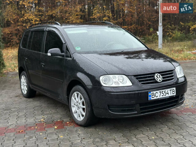 Черный Фольксваген Туран, объемом двигателя 1.6 л и пробегом 255 тыс. км за 5200 $, фото 13 на Automoto.ua
