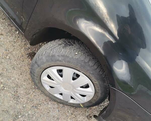 Черный Фольксваген Туран, объемом двигателя 1.6 л и пробегом 218 тыс. км за 5600 $, фото 10 на Automoto.ua