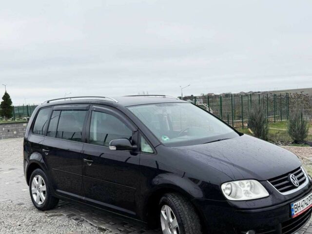 Черный Фольксваген Туран, объемом двигателя 1.6 л и пробегом 264 тыс. км за 5000 $, фото 3 на Automoto.ua