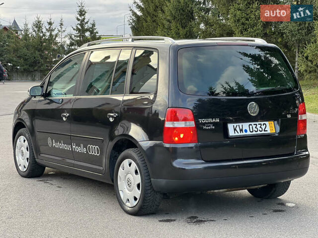 Черный Фольксваген Туран, объемом двигателя 1.6 л и пробегом 195 тыс. км за 5100 $, фото 7 на Automoto.ua