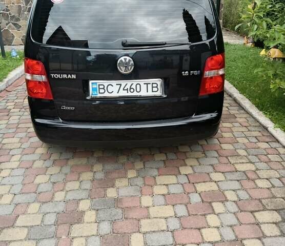 Черный Фольксваген Туран, объемом двигателя 1.6 л и пробегом 234 тыс. км за 5900 $, фото 7 на Automoto.ua